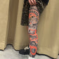 Joustava tatuointikuvioinen säärystin